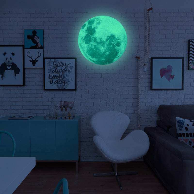 Luminous Wall Stickers Recycling Lunar Environmental Wall Stickers glowing moon decal on blue wall in kids' nautical-themed bedroom. Eco-friendly PVC design.