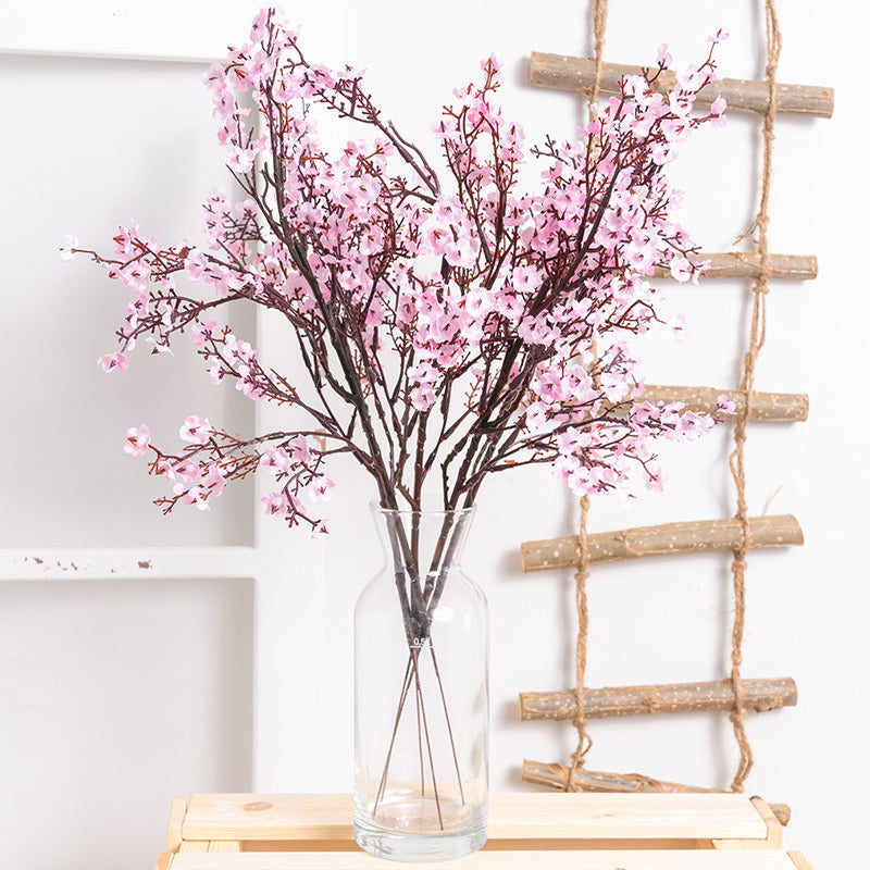 Artificial Gypsophila Flower - Decor | Elegant Arts in vibrant red arranged in a clear glass vase, ideal for home or event decoration