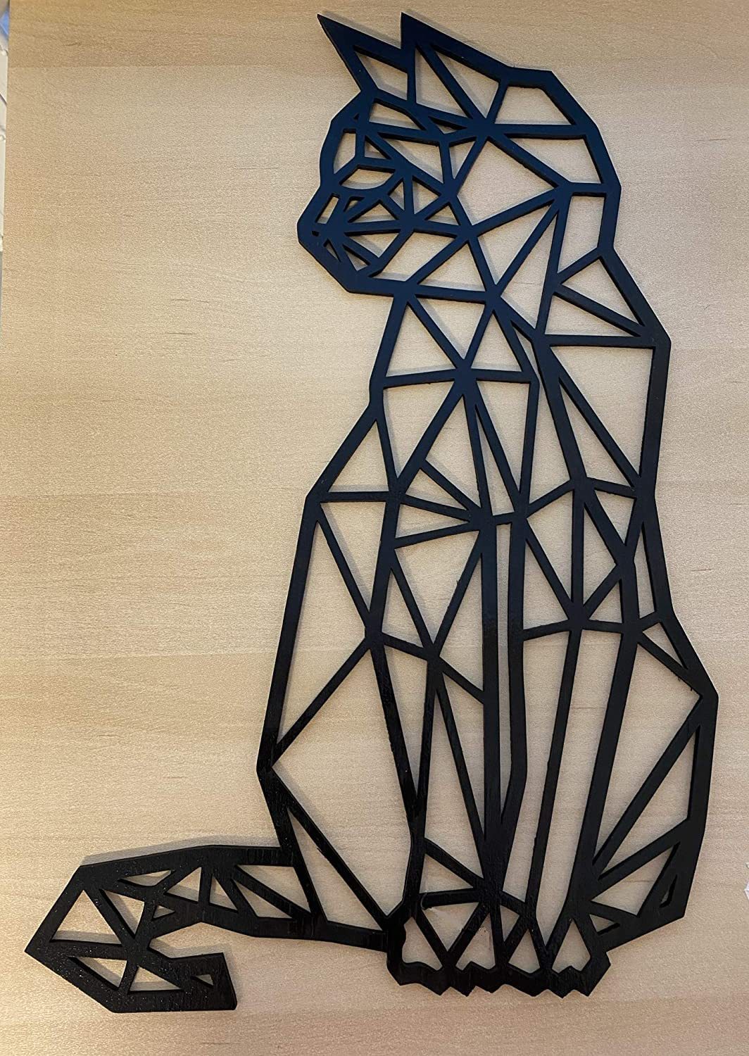 Carved metal wall art featuring a geometric cat ded from laser-engraved galvanized iron.sign, ideal for modern interior home decor and crafte