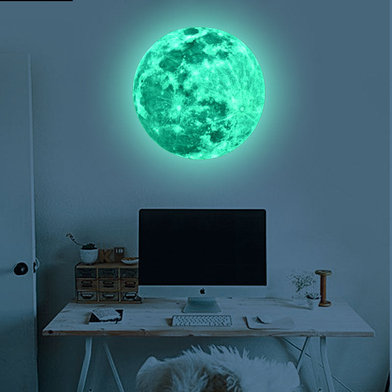 Luminous Wall Stickers Recycling Lunar Environmental Wall Stickers glowing moon decal on blue wall in kids' nautical-themed bedroom. Eco-friendly PVC design.