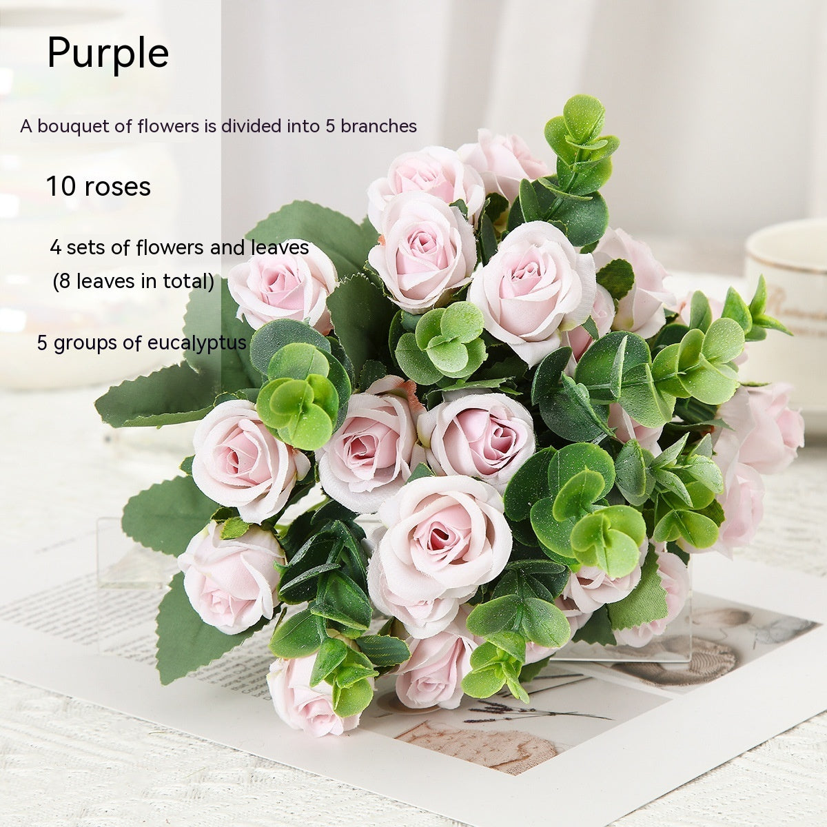 Red silk rose bouquet with green eucalyptus in crystal vase for living room decoration or wedding ceremony artificial flower arrangement.