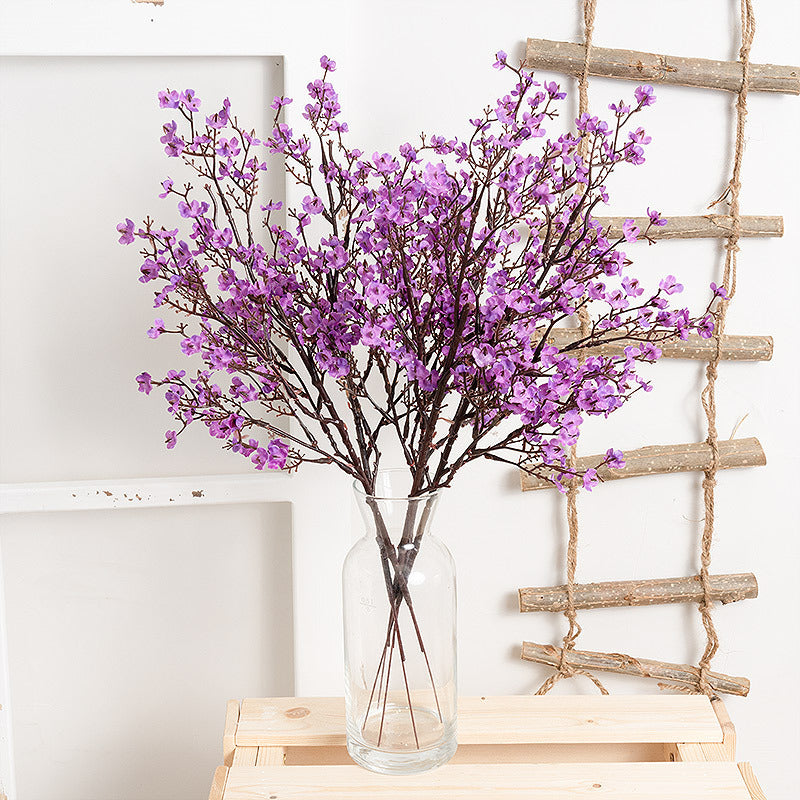Artificial Gypsophila Flower - Decor | Elegant Arts in vibrant red arranged in a clear glass vase, ideal for home or event decoration