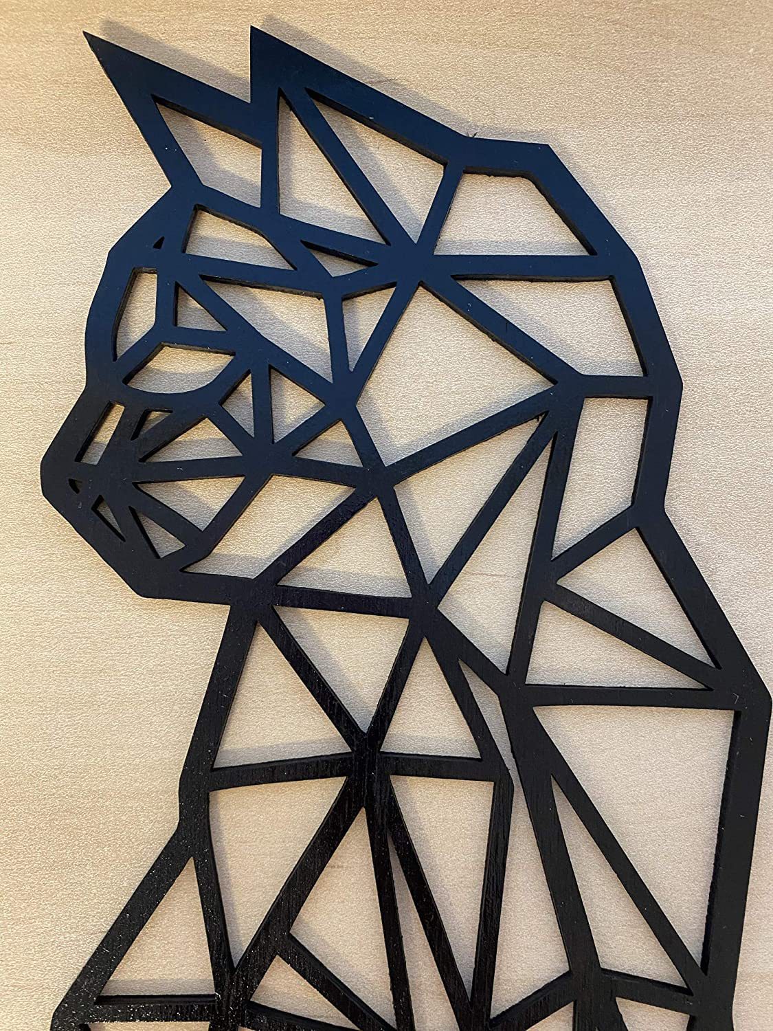 Carved metal wall art featuring a geometric cat ded from laser-engraved galvanized iron.sign, ideal for modern interior home decor and crafte